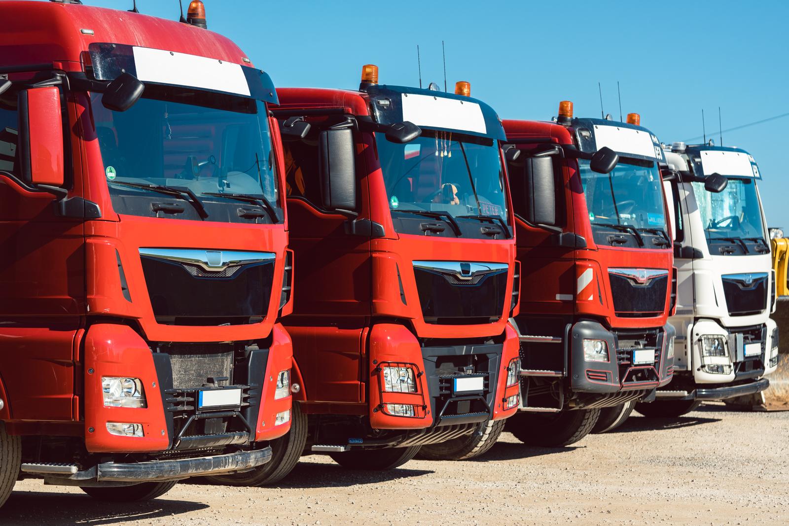 Trucks standing in line on premises